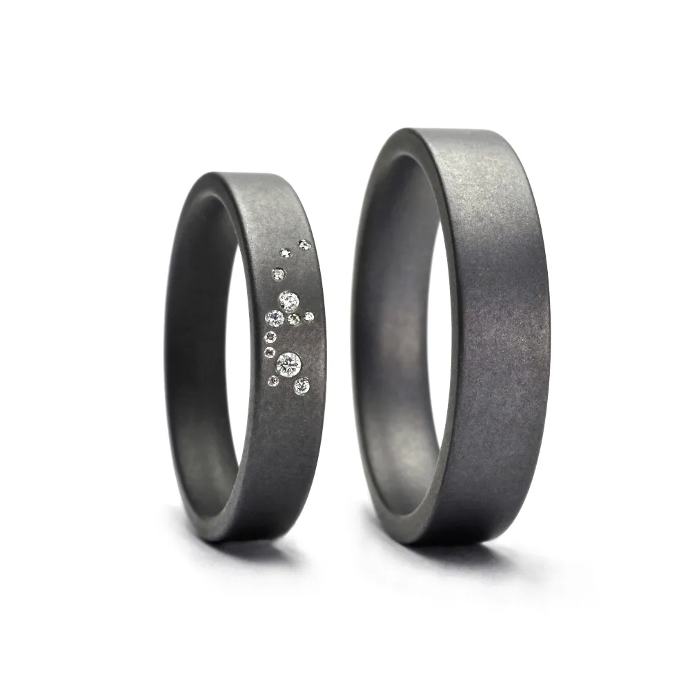 Alianzas de boda de tántalo con diamantes