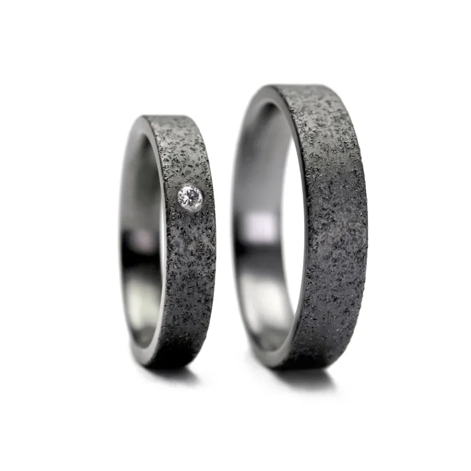 Alianzas de boda de tántalo con diamante