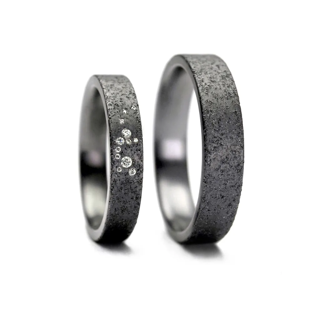 Alianzas de boda de tántalo con diamantes