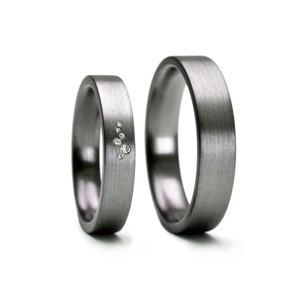 Alianzas de boda de tántalo con diamantes