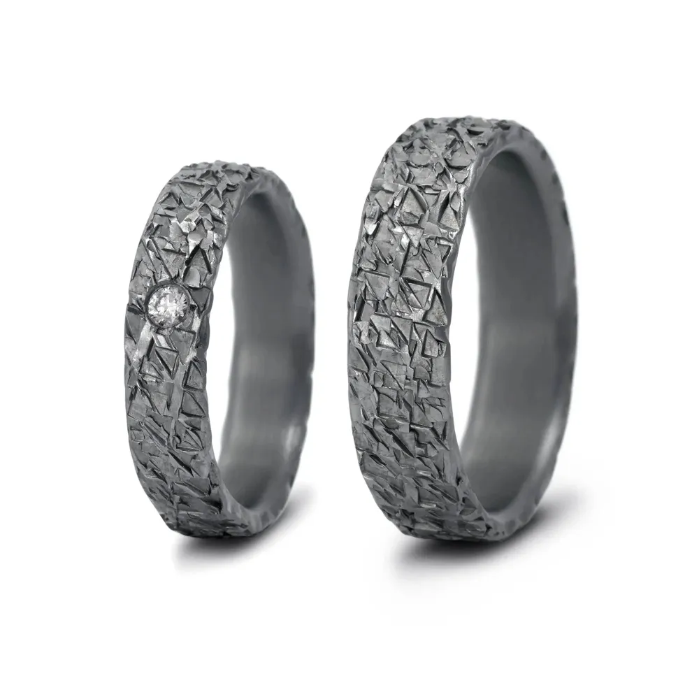 Alianzas de boda de tántalo con diamante