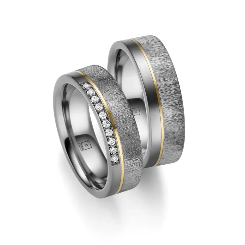 Alianzas de boda de tántalo y oro amarillo con diamantes