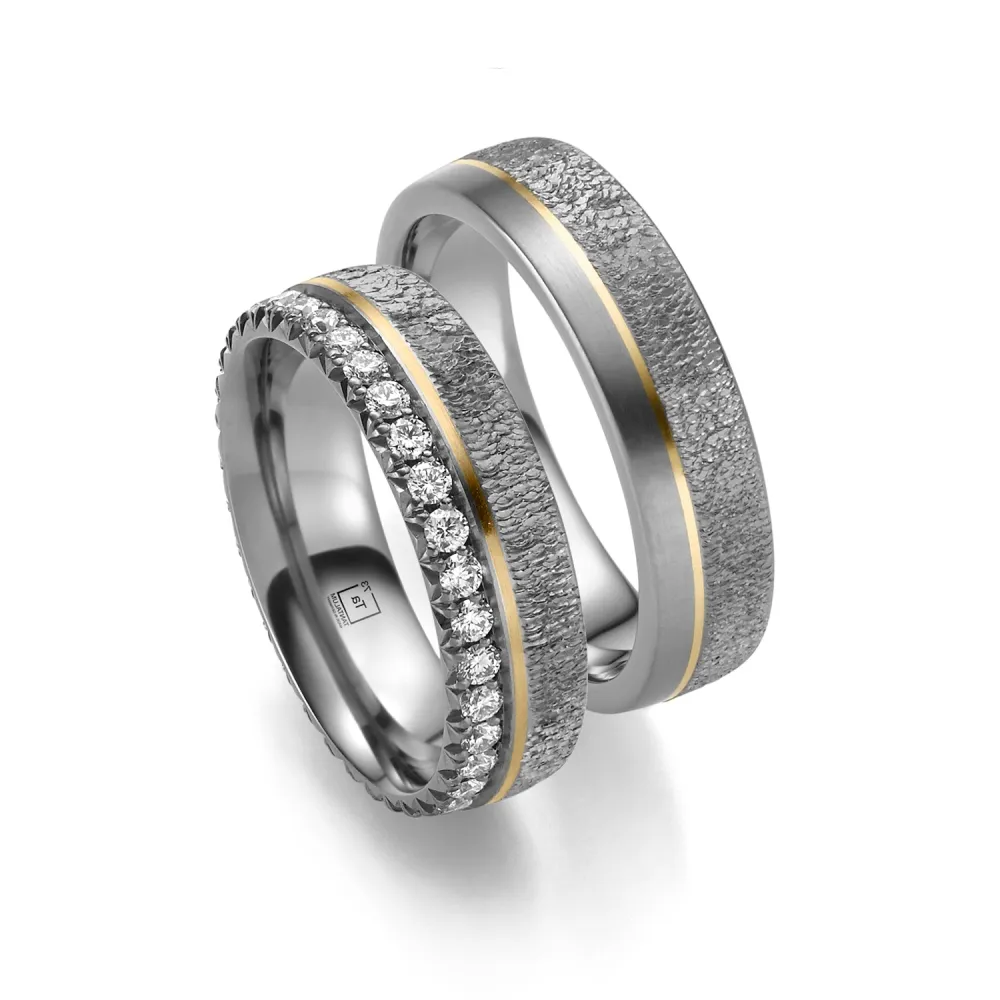Alianzas de boda de tántalo y oro amarillo con diamantes