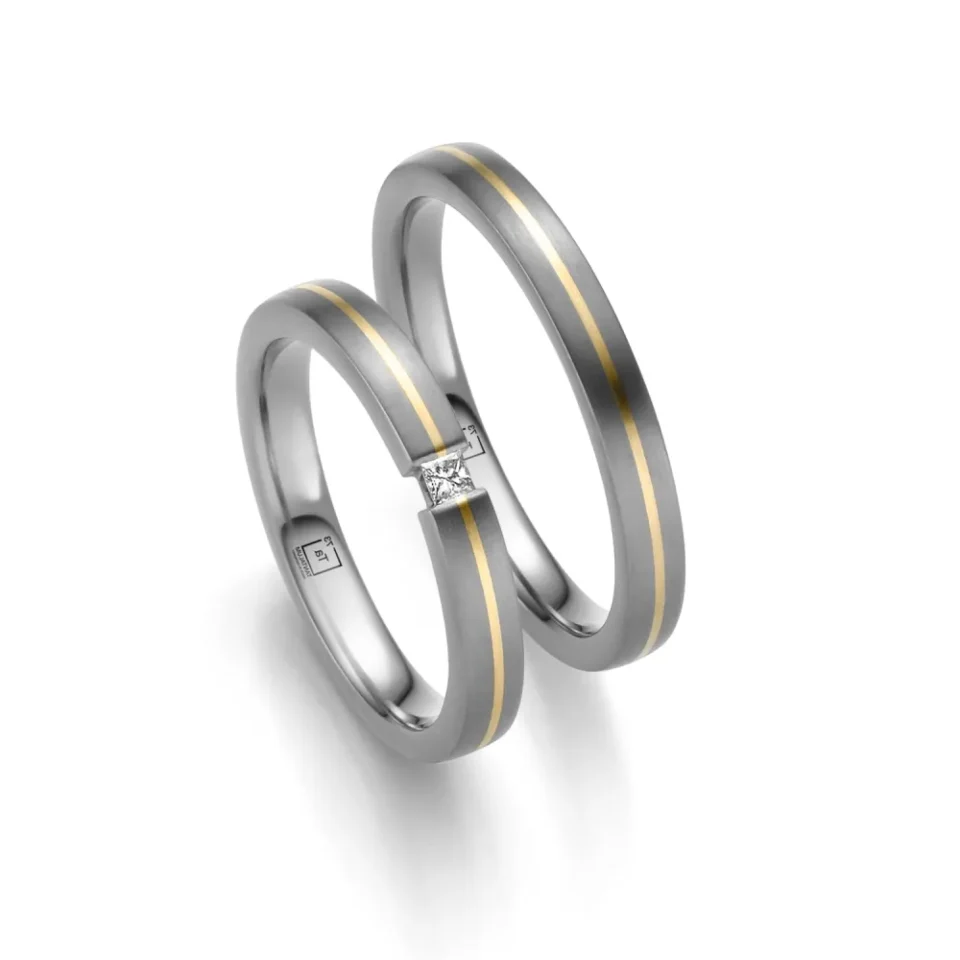 Alianzas de boda de tántalo y oro amarillo con diamante