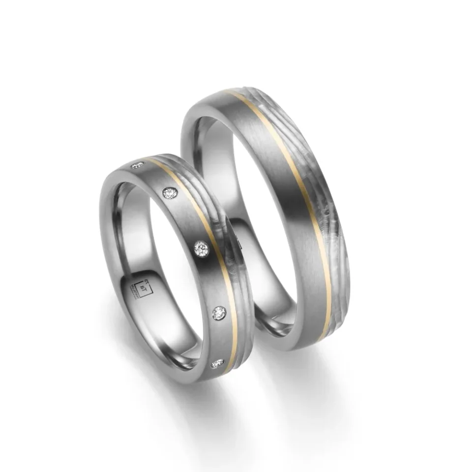 Alianzas de boda de tántalo y oro amarillo con diamantes