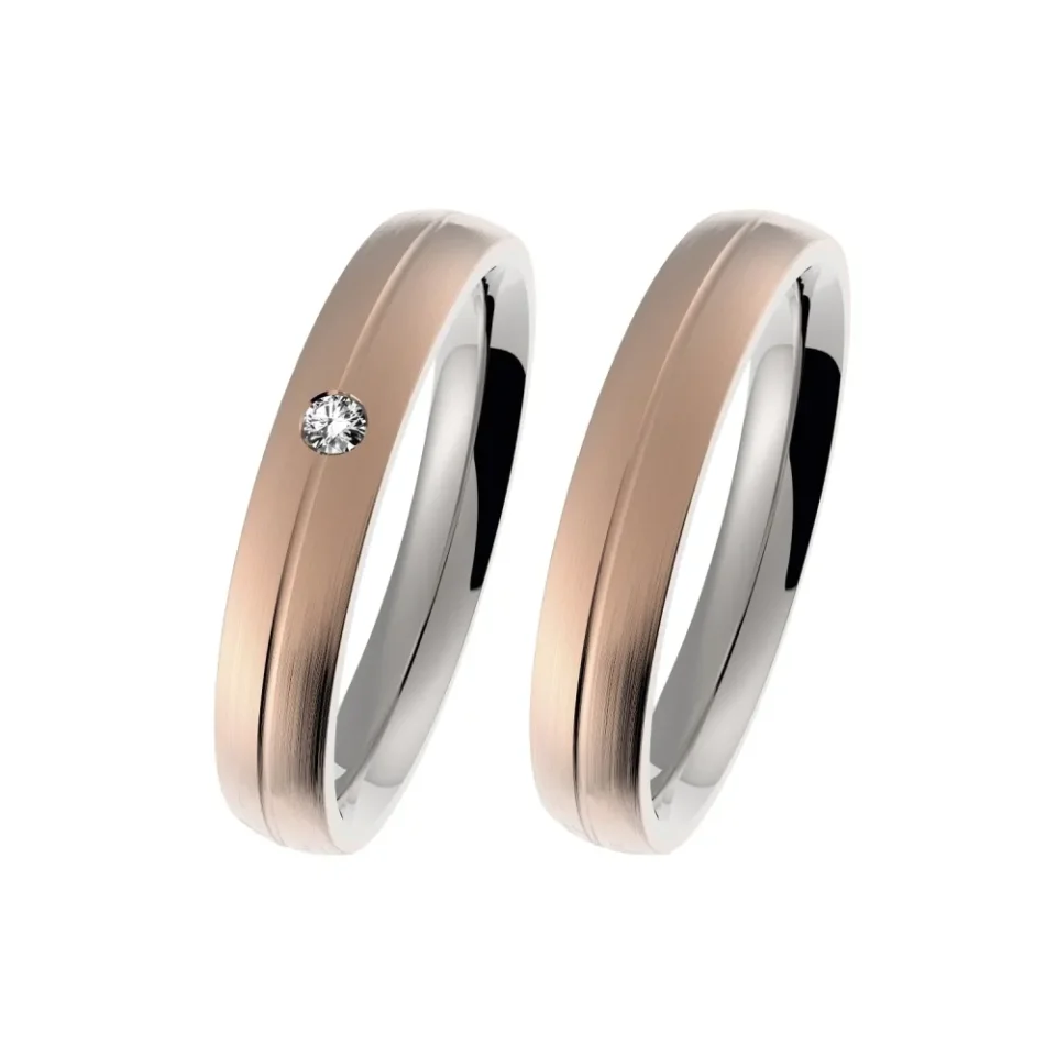 Alianzas de boda de acero y oro rosado con diamante