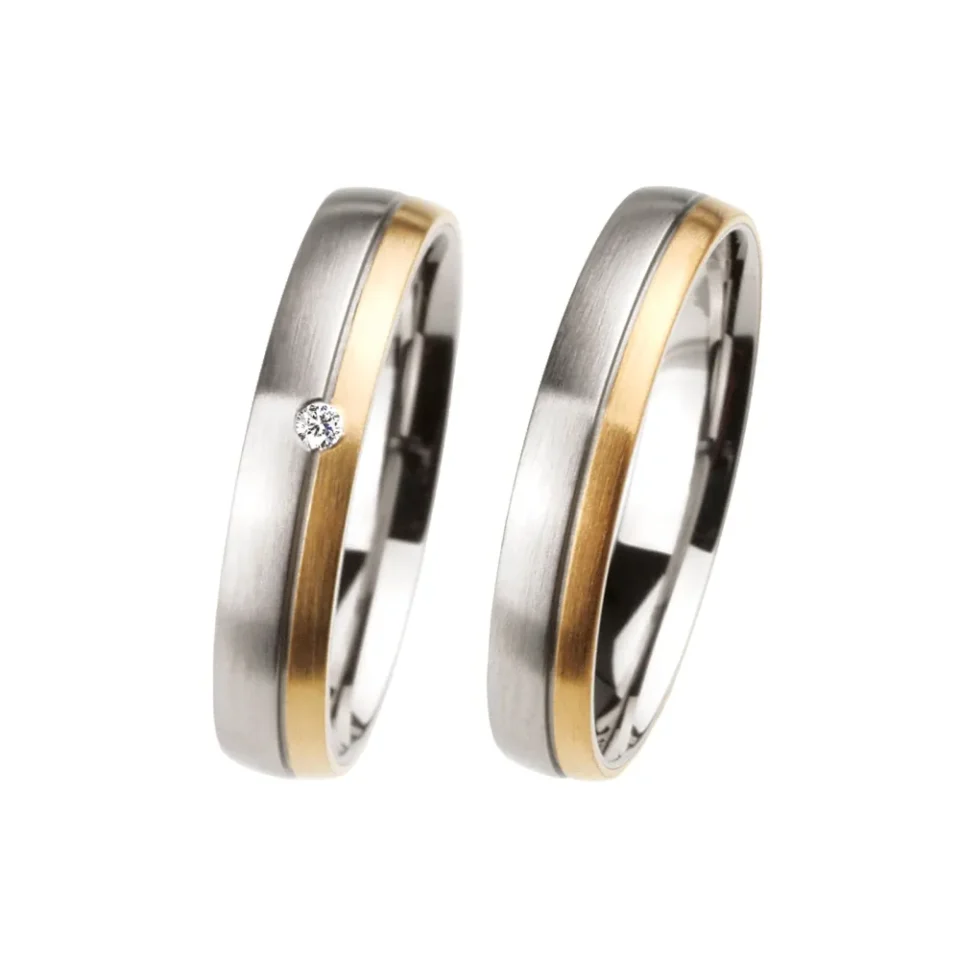 Alianzas de boda de acero y oro amarillo con diamante