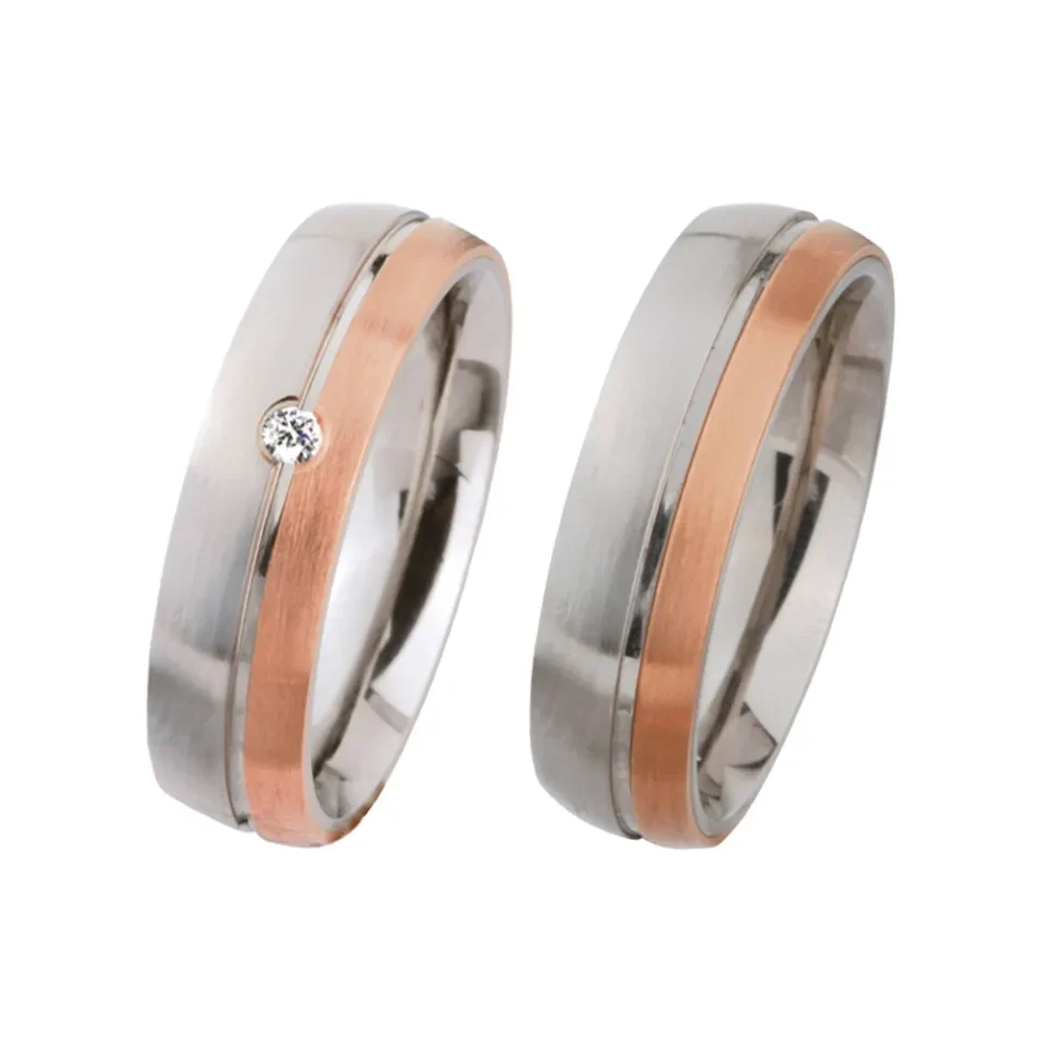 Alianzas de boda de acero y oro rosado con diamante